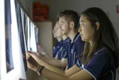 Medical Radiation Science Medical Imaging students checking x-rays